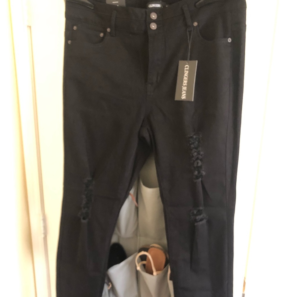 Mid rise skinny black ripped jeans